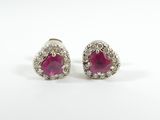 une paire de boucles d'oreilles en rubis et diamants