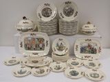 a lot of plates and bowls on the table