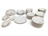 a lot of plates that are sitting on a table