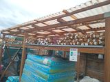 many stacks of wood stacked on top of each other