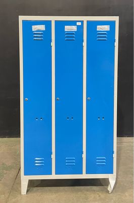 two blue metal lockers sitting next to each other on a cement floor