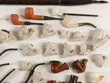 many different types of pipes and pipes on the table