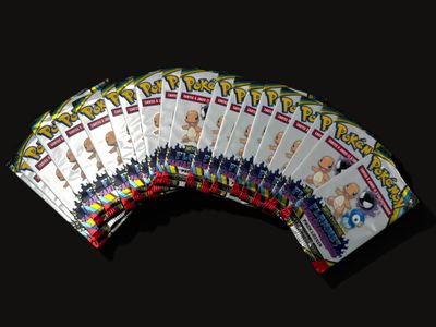a bunch of cards that are on a black background