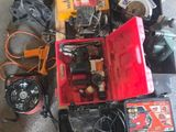 a lot of tools that are sitting on the floor