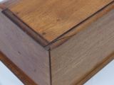 a wooden box that has a handle on it