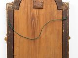 an old wooden door with a green string hanging from it