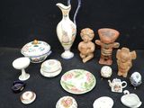 many different pieces of pottery on the table