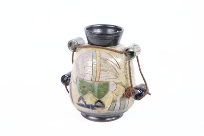a small vase with a handle on a white background