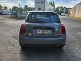 a small car parked on the side of the road