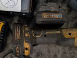 many tools that are laying out on the ground