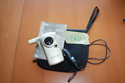 a cell phone that is sitting on a bag