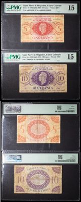 four different types of bank notes are on display in a black box