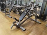 a lot of machines that are on the floor in the gym