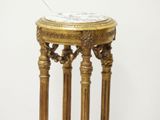 a small table with a marble top on it
