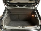 a trunk of a car with the back door open