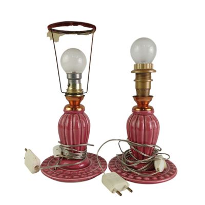 pair of red and gold table lamps with white lampshads