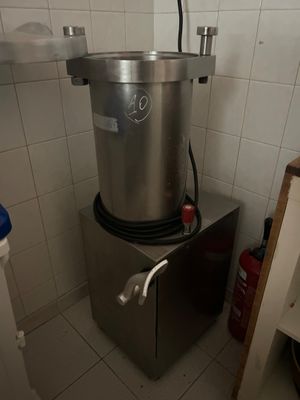 an image of a kitchen with a large pot on top of it
