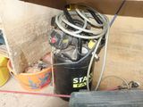 an image of a bunch of tools that are on the ground