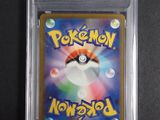 a close up of a pokemon card on a table