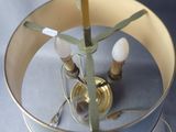 a lamp that is sitting on a table with a lamp on it