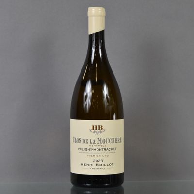 a bottle of wine that is sitting on a table