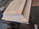 a piece of wood sitting on top of a table