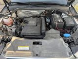 the engine of a car with its hood open and the hood open