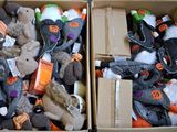 two boxes of stuffed animals that are in the same box