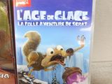 two nintendo wii games, one with a squirrel and the other with a squirrel on it