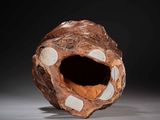 a large piece of wood with holes in it