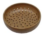 a wooden bowl with holes in it on a white background