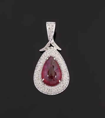 a pear shaped ruby and diamond pendant