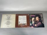 a close up of a cd case with a picture of a woman on it