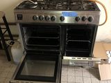 a stove that has two ovens inside of it