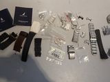 a table with a bunch of watches on it