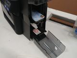 a printer that is sitting on a counter top