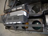 a lot of electronic equipment that is sitting on top of each other