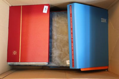 two books in a box one is red and the other is blue