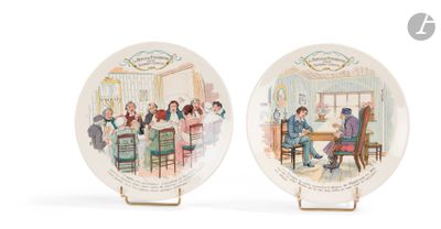 pair of porcelain plates with a picture of a group of people sitting at a table