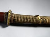 an image of a very nice looking knife on a table