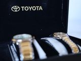 two watches in a black box with a toyota logo on it