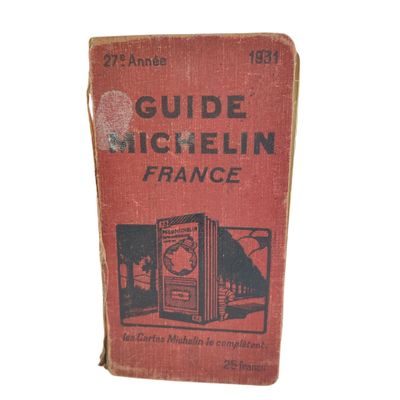 a red book with a picture of a clock on it