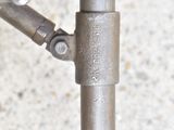 a close up of a metal pipe on the ground
