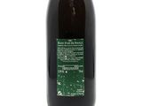 a bottle of wine that is sitting on a table