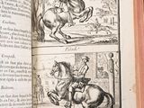 an open book with a picture of a man on a horse