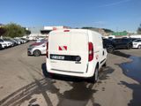 a white van that is parked in a parking lot