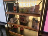 a shelf that has a lot of food on it