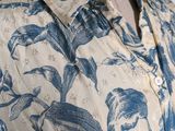 a close up of a shirt on a mannequin mannequin