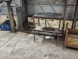 a picture of a room with a lot of wood on the floor