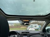 a view from inside of a car of a parking lot